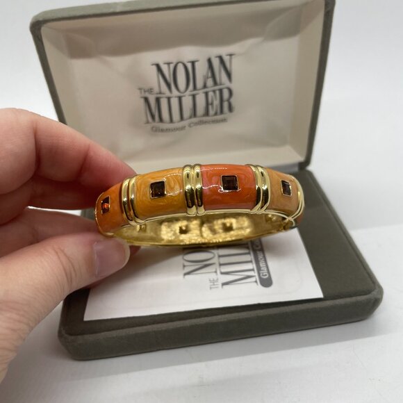 Nolan Miller Jewelry - Nolan Miller Orange/ Peach Enamel Hinged Bangle Bracelet w brown inlaid crystals